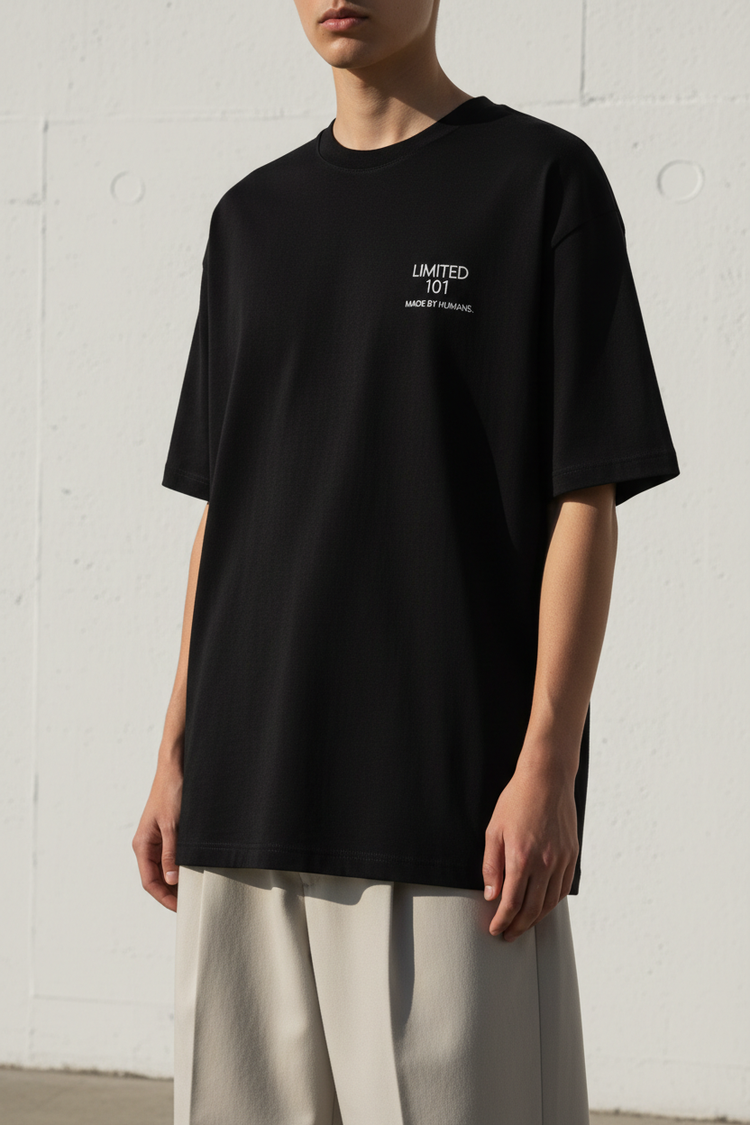 LIMITED 101 HUMAN TEE worn by model — editorial streetwear